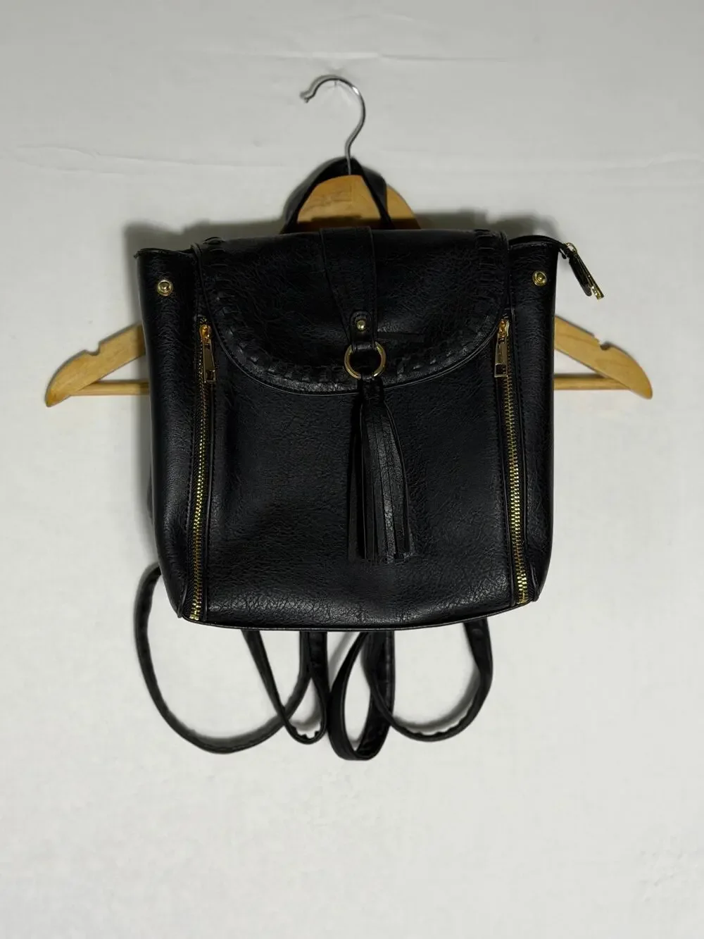 Black Faux Leather Backpack Purse Leopard Print Lining Gold Hardware Tassel